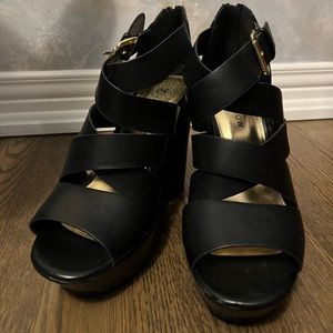 Harlow black wedges with gold buckles and zippers